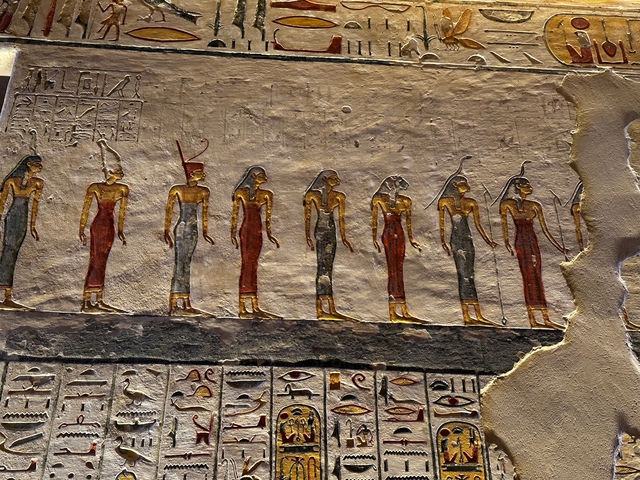 Detailed Egyptian wall art with figures.