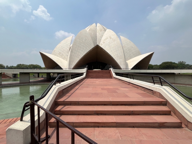 Lotus Temple's symmetrical architecture and reflecting pool.