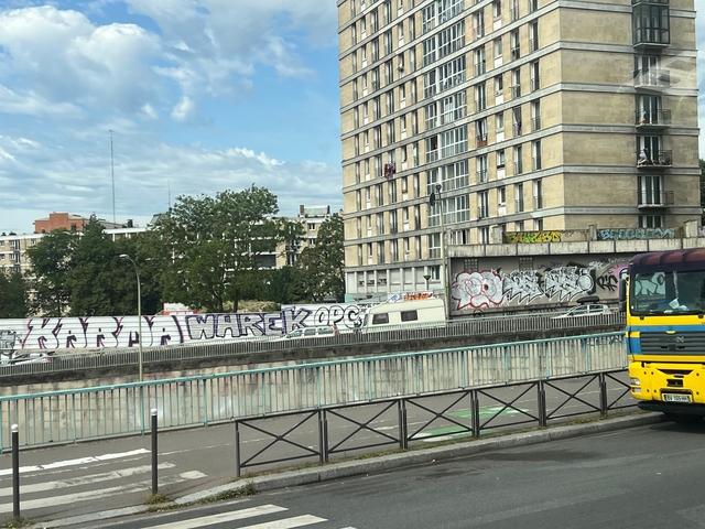 Urban environment with graffiti and buildings.