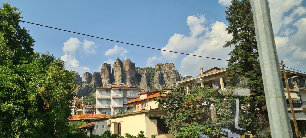 Rock formations with residential buildings in the foreground