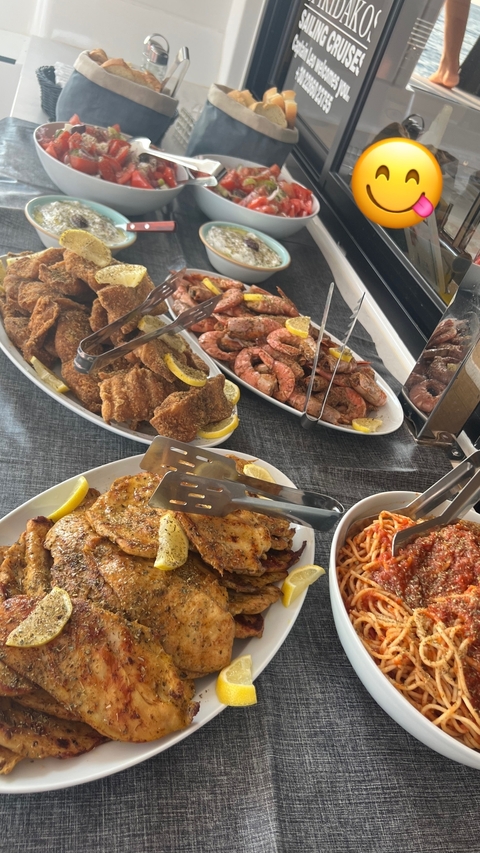 Plates of assorted seafood dishes.