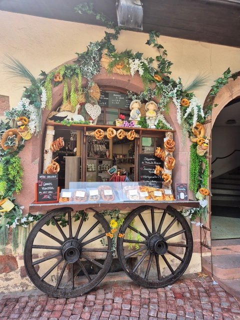 Traditional bakery display with pretzels and baked goods.