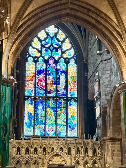 Stained glass window inside a church.