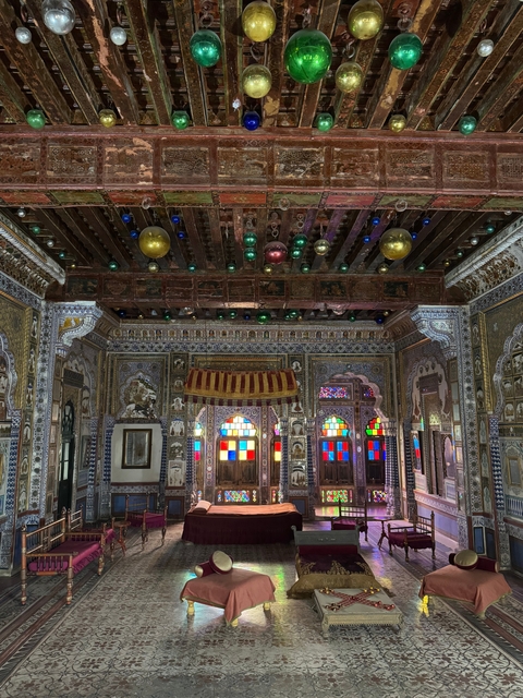       Interior of a building with colorful decorations.
  