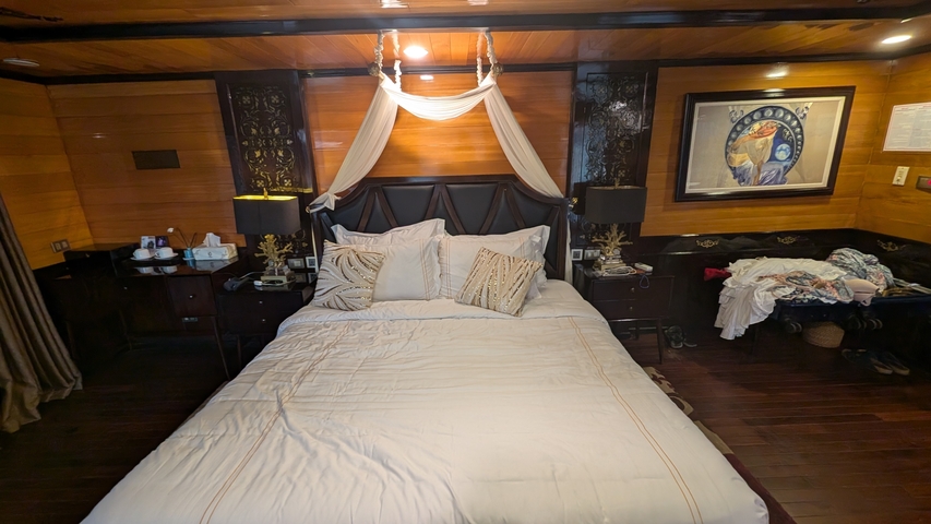 Luxury bedroom with a large bed and decor.