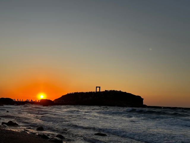       Sunset view of the Temple of Apollo on Naxos island.
  