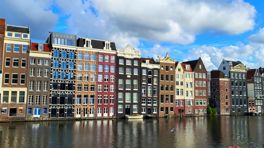 Classic canal-side buildings in Amsterdam.