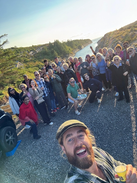 A group of people gathered outdoors.