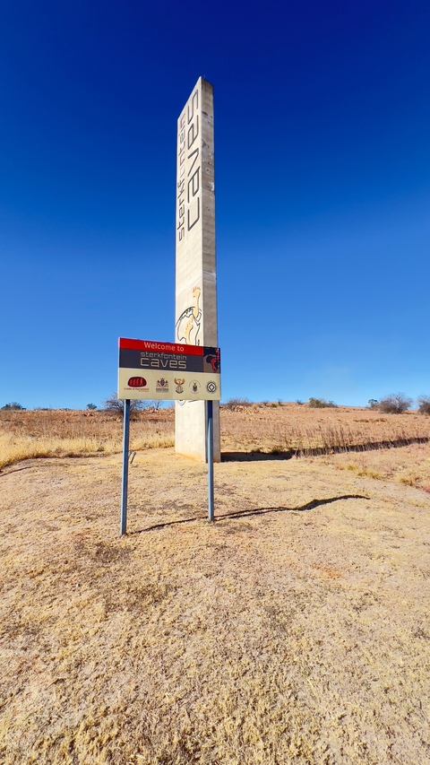       Sign for the Sterkfontein Caves.
  