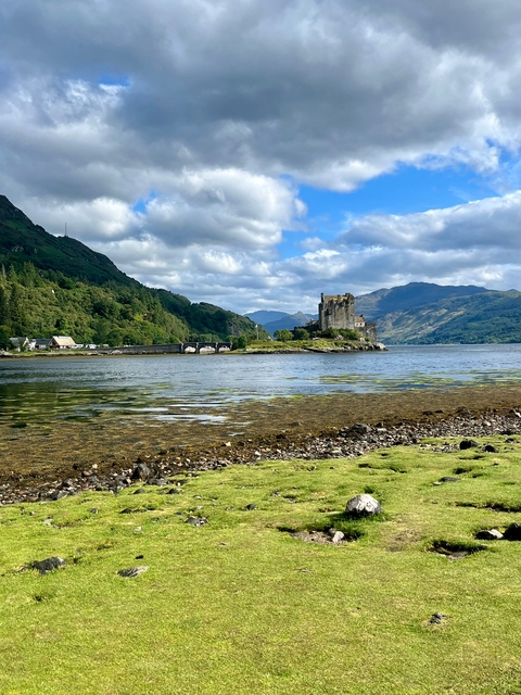 View of a stone castle on a small island in a loch.