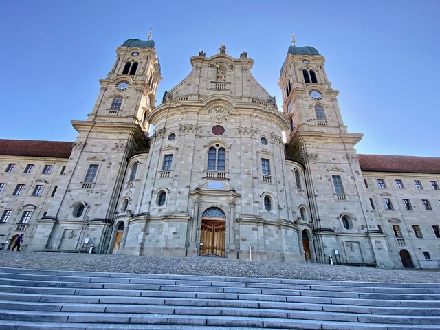 Baroque-style church facade with twin towers.