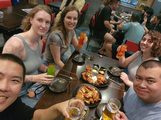 Group of friends enjoying a meal together.
