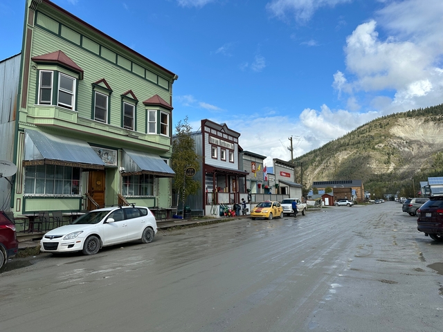 A rural street with vintage buildings.