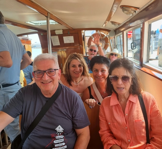 Group on a boat in Venice canal