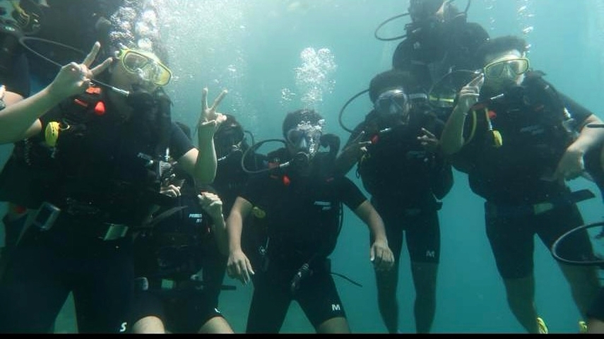 Group scuba diving underwater