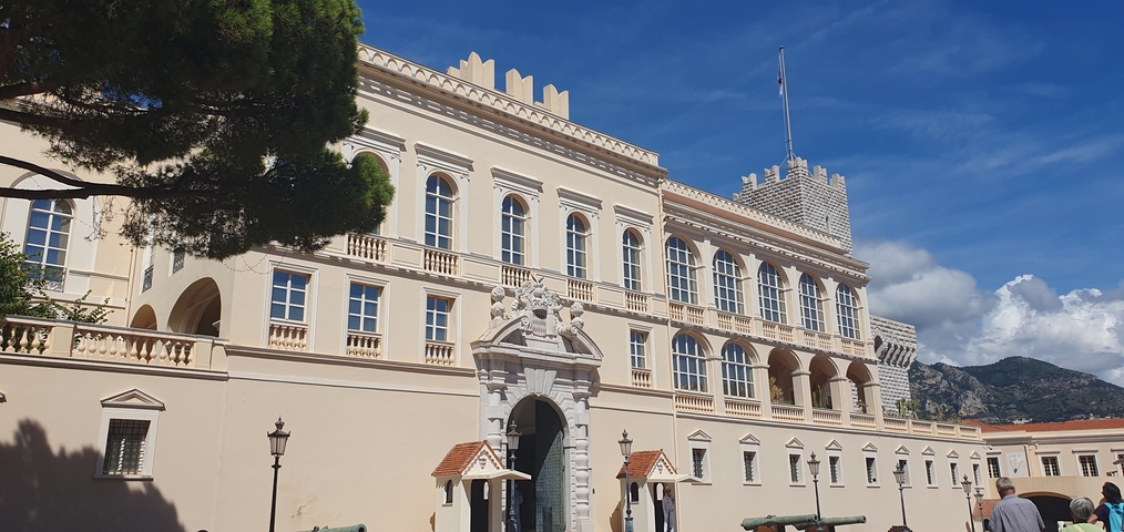       Historic government building with a flag on top.
  