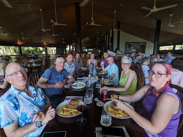Group of people dining inside a restaurant.