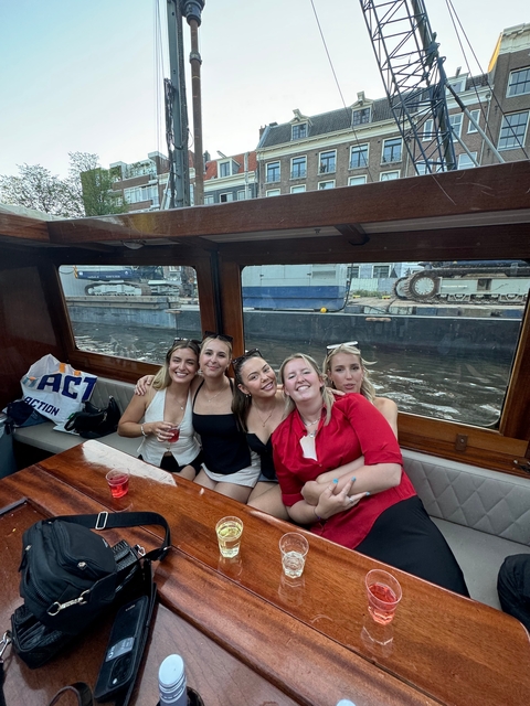 Group of women enjoying a boat ride.