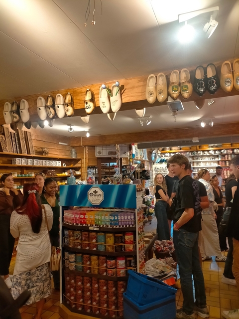Crowded store with shelves of souvenirs and decoration.