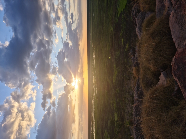 Sunset view over a vast landscape.