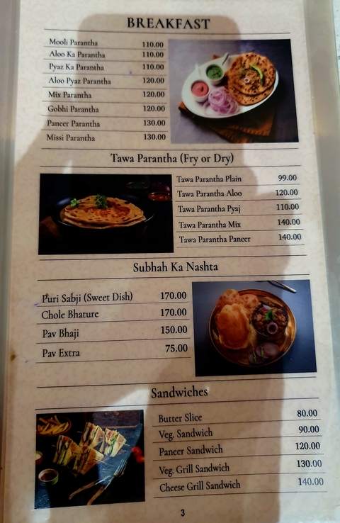       A menu with dishes and prices.
  