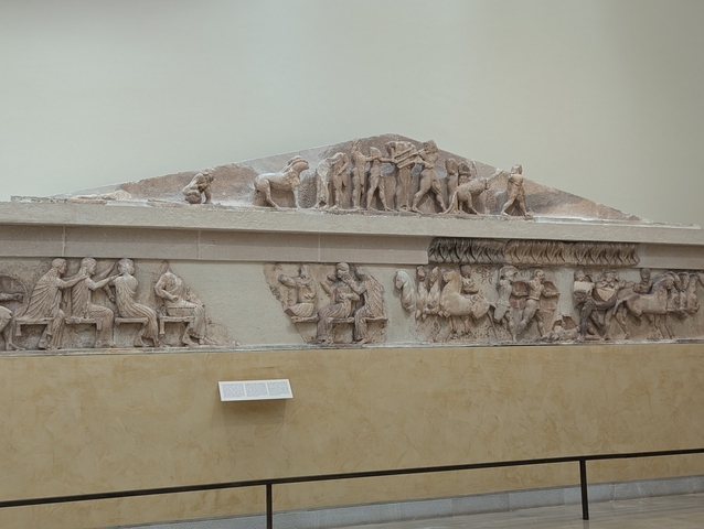 Ancient Greek frieze depicting a historical scene.