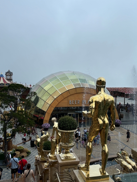       A large dome structure labeled 'BEER PLAZA' with fountains.
  