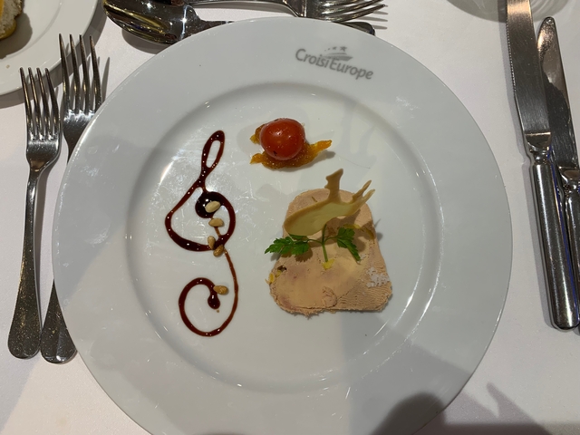 Fancy dish with artistic presentation on plate.