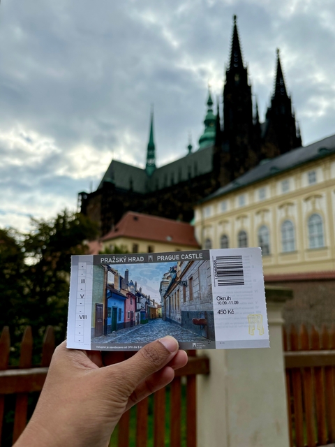 Ticket for Prague Castle with the castle in the background.