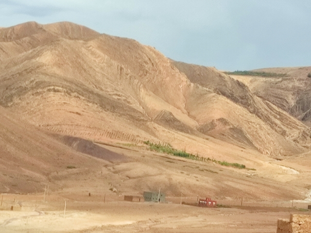       Distant mountains with a vast landscape.
  