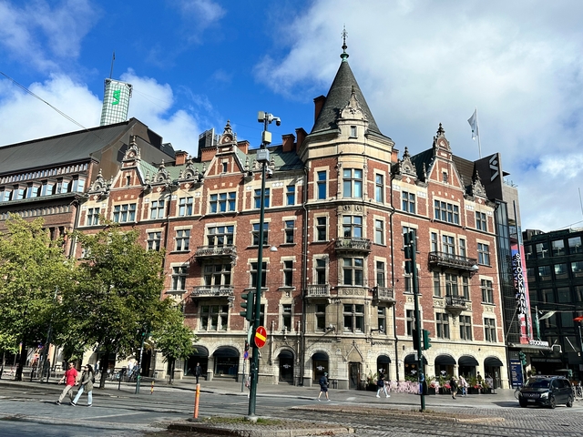 Detailed facade of a red brick building.