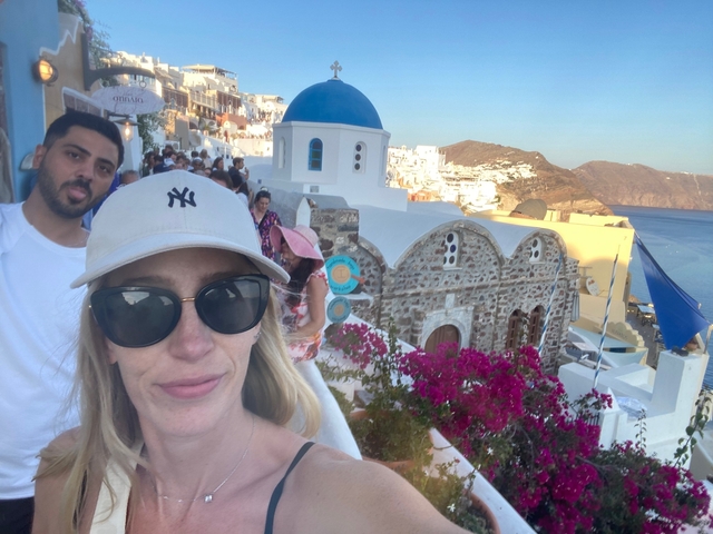 A selfie with famous Santorini architecture and sea view.