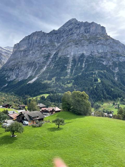Mountain landscape with a small village at the base