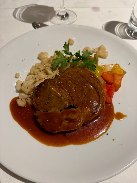 Roast with sauce, spaetzle and vegetables