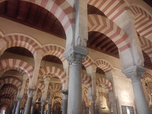 Archways with striped red and white design.