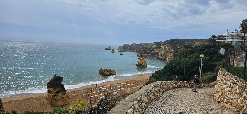 Scenic view of a beach and rocky coastline