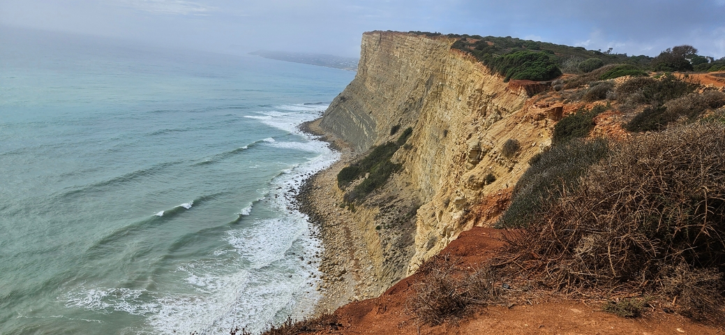 Dramatic cliffs and ocean waves