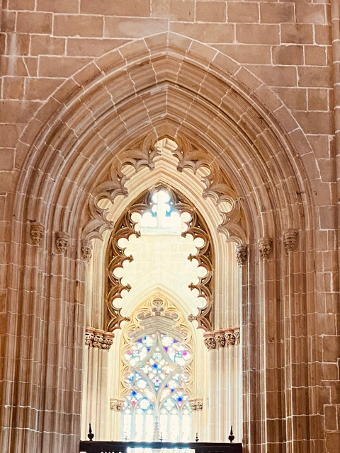       Intricate gothic architecture inside a church.
  