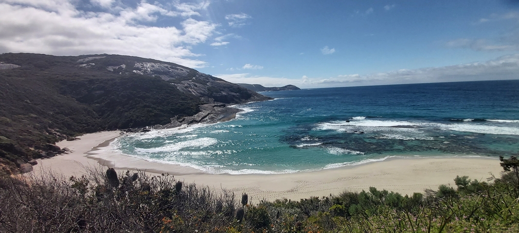 Scenic view of a beach with turquoise water and white sand