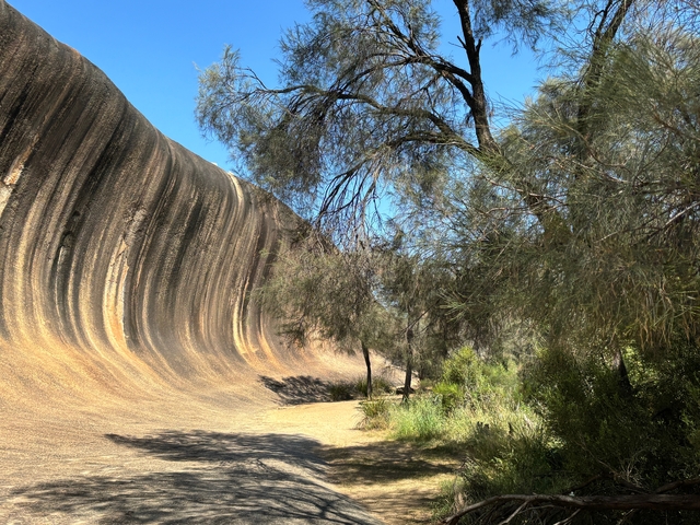       Wave Rock formation, a large natural rock formation resembling a wave.
  