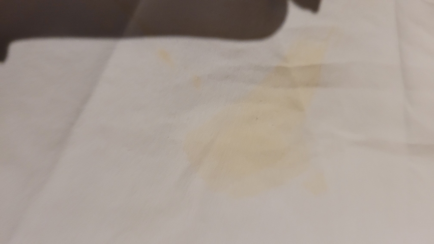 Close-up of a stained white surface.