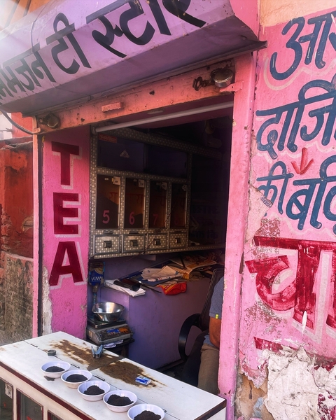 Colorful shopfront with signs for tea.