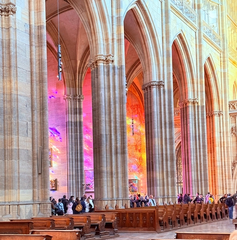 Colorful stained glass reflection on cathedral columns