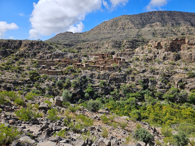 Rugged mountain landscape with traditional village.