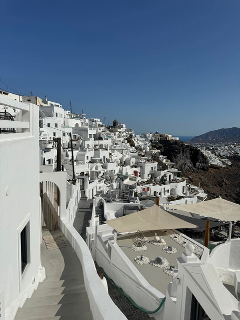       White hillside village with a view of the sea
  