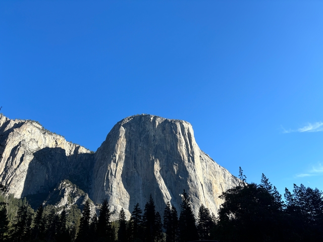 El Capitan rock formation under clear blue sky.