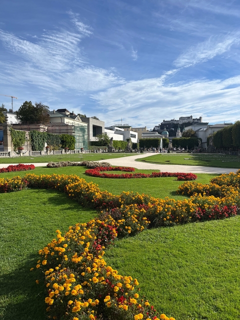 Beautifully landscaped garden with a historic backdrop.