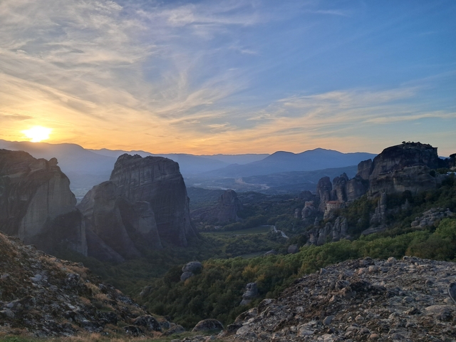 Sunset view of towering rock formations.