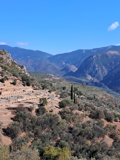       Mountainous landscape with ancient ruins.
  