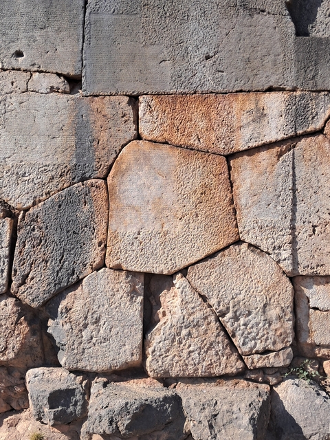 Close-up of textured stone wall.